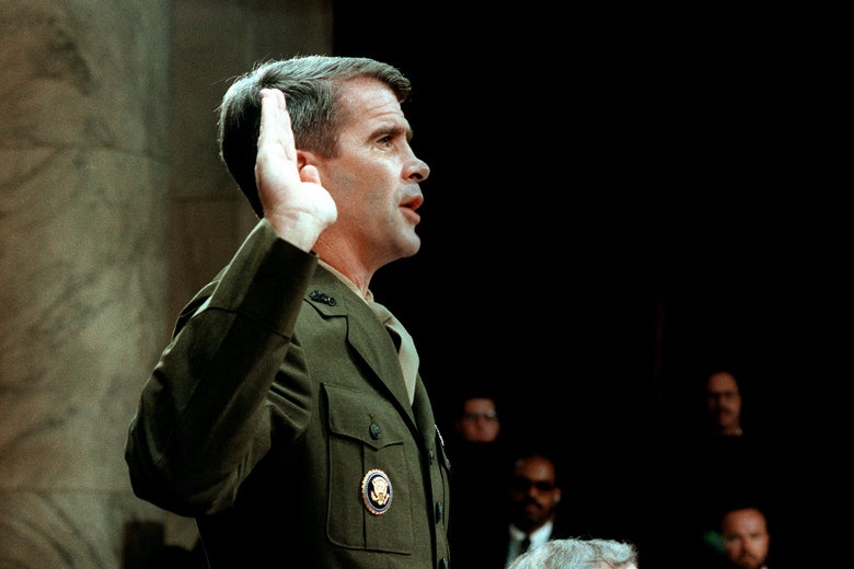 Oliver North, wearing a Marine uniform, raises his right hand.